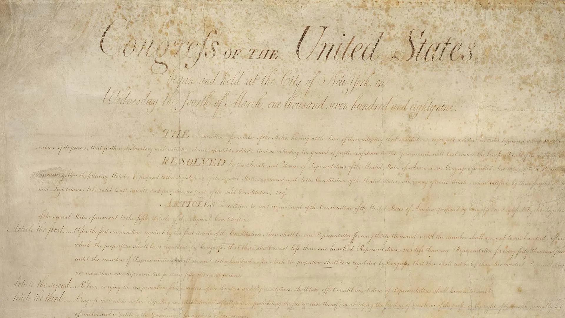 Historical parchment displaying the preamble and initial articles of the Bill of Rights, dated in New York, March 1789.